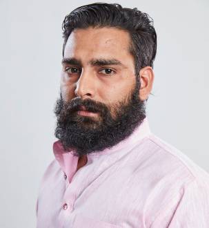 Manveer Gurjar: He is a rustic, non-urban and proud Indian village man, hailing from a joint family of about 47-48 members. He collects the rent for the property that his family has rented out. He is quite short tempered and definitely not one that one would want to meddle with. 