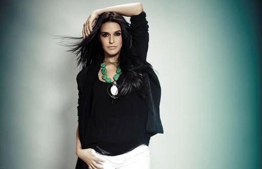 Model and actress Neha Dhupia appeared in a song of the Pakistani film Kabhi Pyar Na Karna.